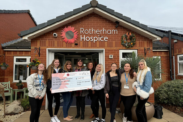 Students holding a stall to raise money for Sunbeams Charity at Rotherham Hospice